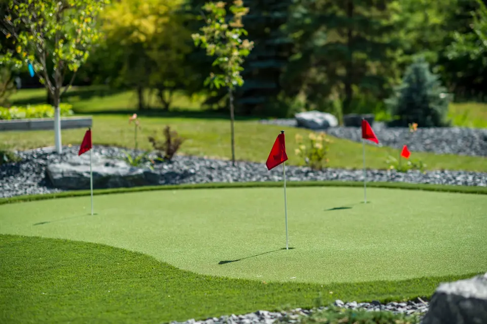 Putting green with red flags